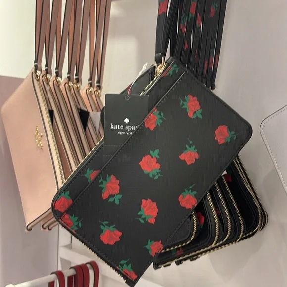 Kate Spade Lucy Medium L-Zip Wristlet
COLOR:
Black Multi
NWT - Picture 5 of 16